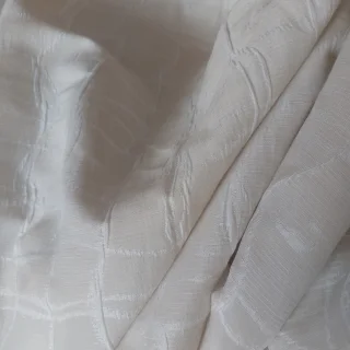 Tkanina zasłonowa kremowa w delikatny wzór 150 cm